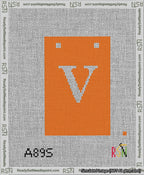 A taped needlepoint canvas with the design: Banner 13 mesh count Squared V White on Orange.
