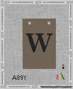 A taped needlepoint canvas with the design: Banner 13 mesh count Squared W Black on Brown.