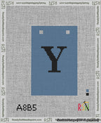 A taped needlepoint canvas with the design: Banner 13 mesh count Squared Y Black on Blue.