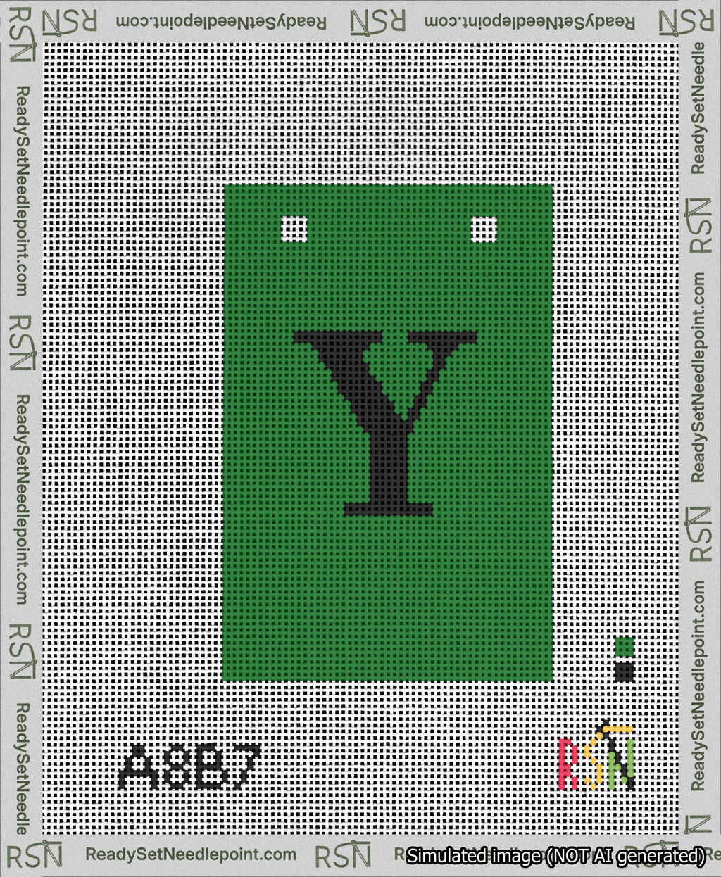 A taped needlepoint canvas with the design: Banner 13 mesh count Squared Y Black on Green.