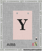 A taped needlepoint canvas with the design: Banner 13 mesh count Squared Y Black on Pink.