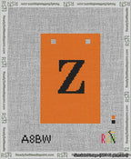 A taped needlepoint canvas with the design: Banner 13 mesh count Squared Z Black on Orange.