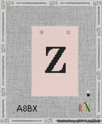 A taped needlepoint canvas with the design: Banner 13 mesh count Squared Z Black on Pink.