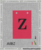 A taped needlepoint canvas with the design: Banner 13 mesh count Squared Z Black on Red.