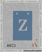A taped needlepoint canvas with the design: Banner 13 mesh count Squared Z White on Blue.
