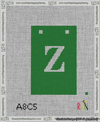 A taped needlepoint canvas with the design: Banner 13 mesh count Squared Z White on Green.