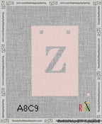 A taped needlepoint canvas with the design: Banner 13 mesh count Squared Z White on Pink.