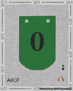 A taped needlepoint canvas with the design: Banner 18 mesh count Curved 0 Black on Green.