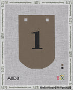 A taped needlepoint canvas with the design: Banner 18 mesh count Curved 1 Black on Brown.
