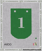 A taped needlepoint canvas with the design: Banner 18 mesh count Curved 1 White on Green.