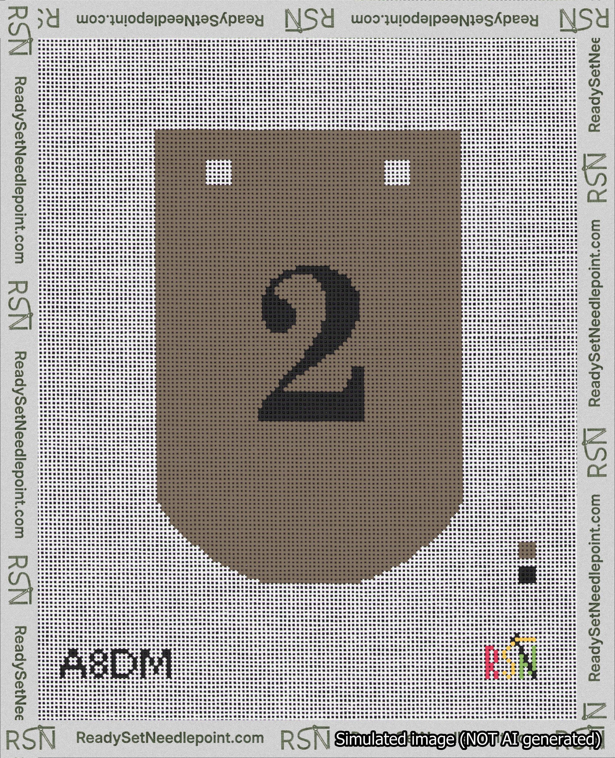 A taped needlepoint canvas with the design: Banner 18 mesh count Curved 2 Black on Brown.