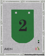 A taped needlepoint canvas with the design: Banner 18 mesh count Curved 2 Black on Green.