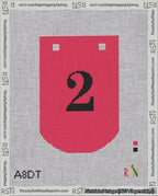 A taped needlepoint canvas with the design: Banner 18 mesh count Curved 2 Black on Red.