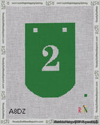 A taped needlepoint canvas with the design: Banner 18 mesh count Curved 2 White on Green.