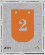 A taped needlepoint canvas with the design: Banner 18 mesh count Curved 2 White on Orange.