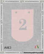 A taped needlepoint canvas with the design: Banner 18 mesh count Curved 2 White on Pink.