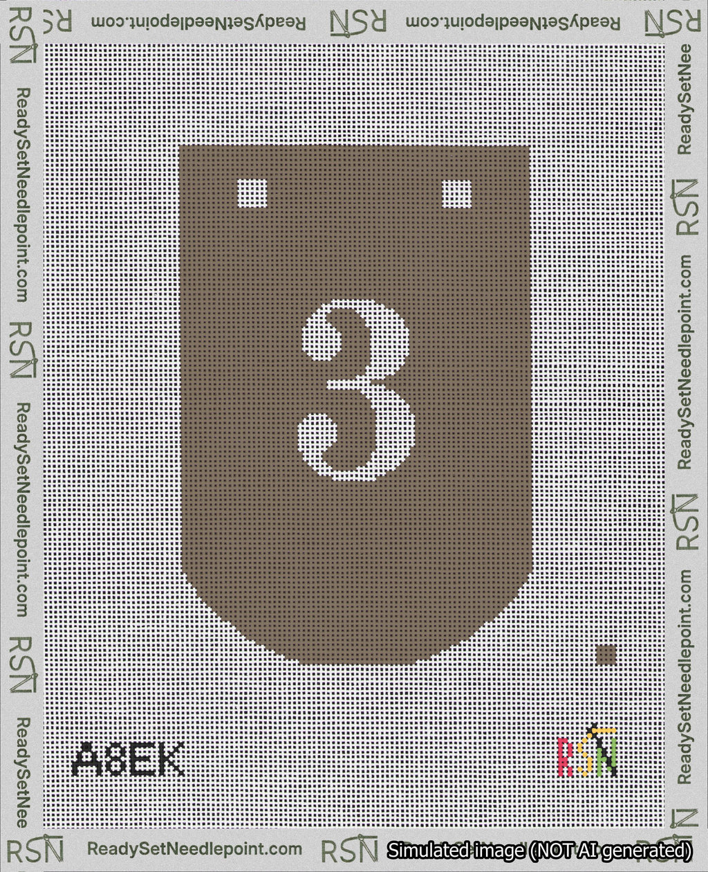 A taped needlepoint canvas with the design: Banner 18 mesh count Curved 3 White on Brown.