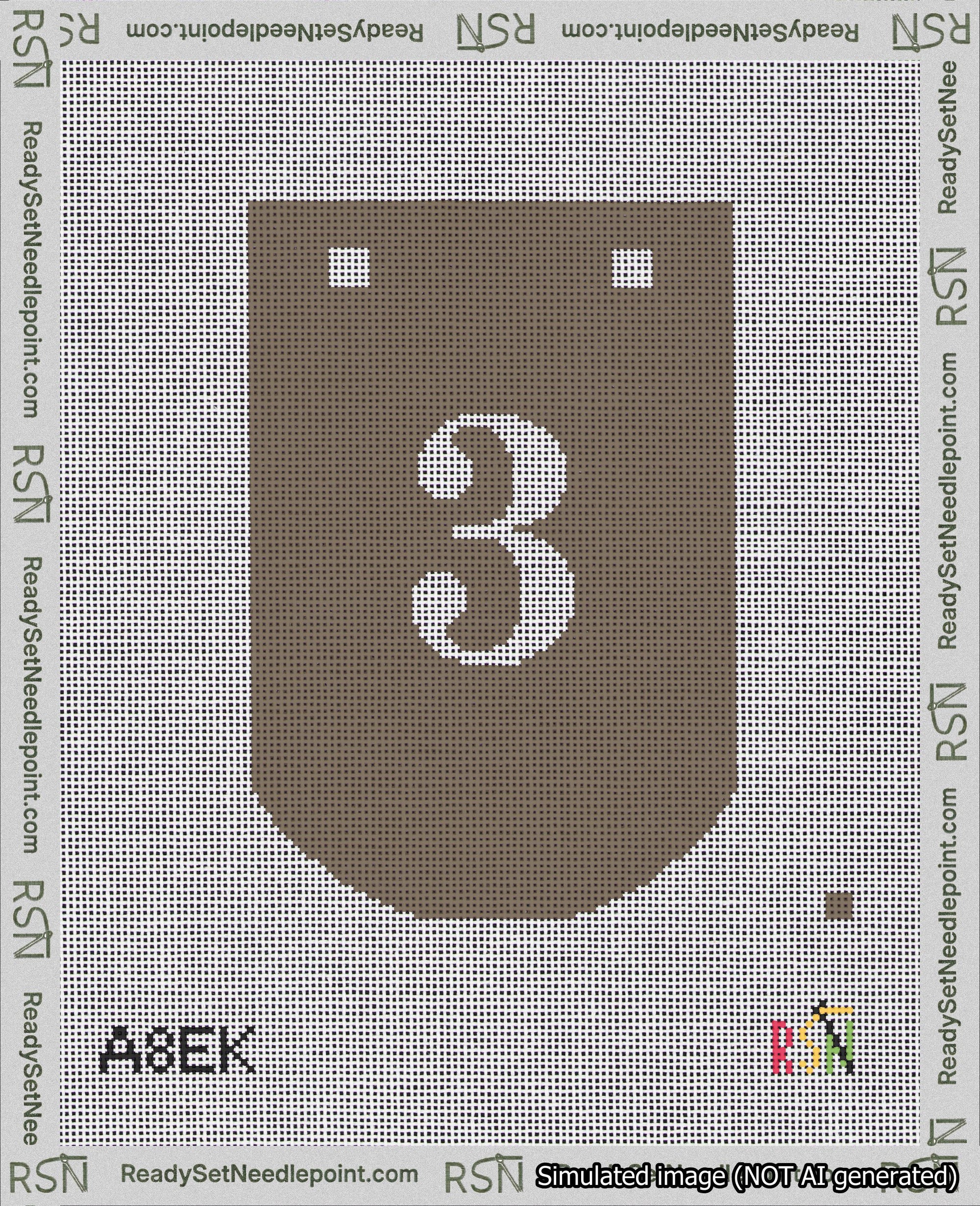 A taped needlepoint canvas with the design: Banner 18 mesh count Curved 3 White on Brown.