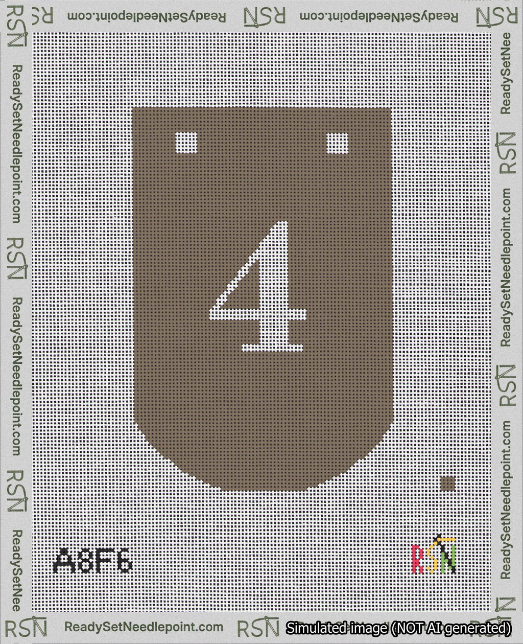 A taped needlepoint canvas with the design: Banner 18 mesh count Curved 4 White on Brown.