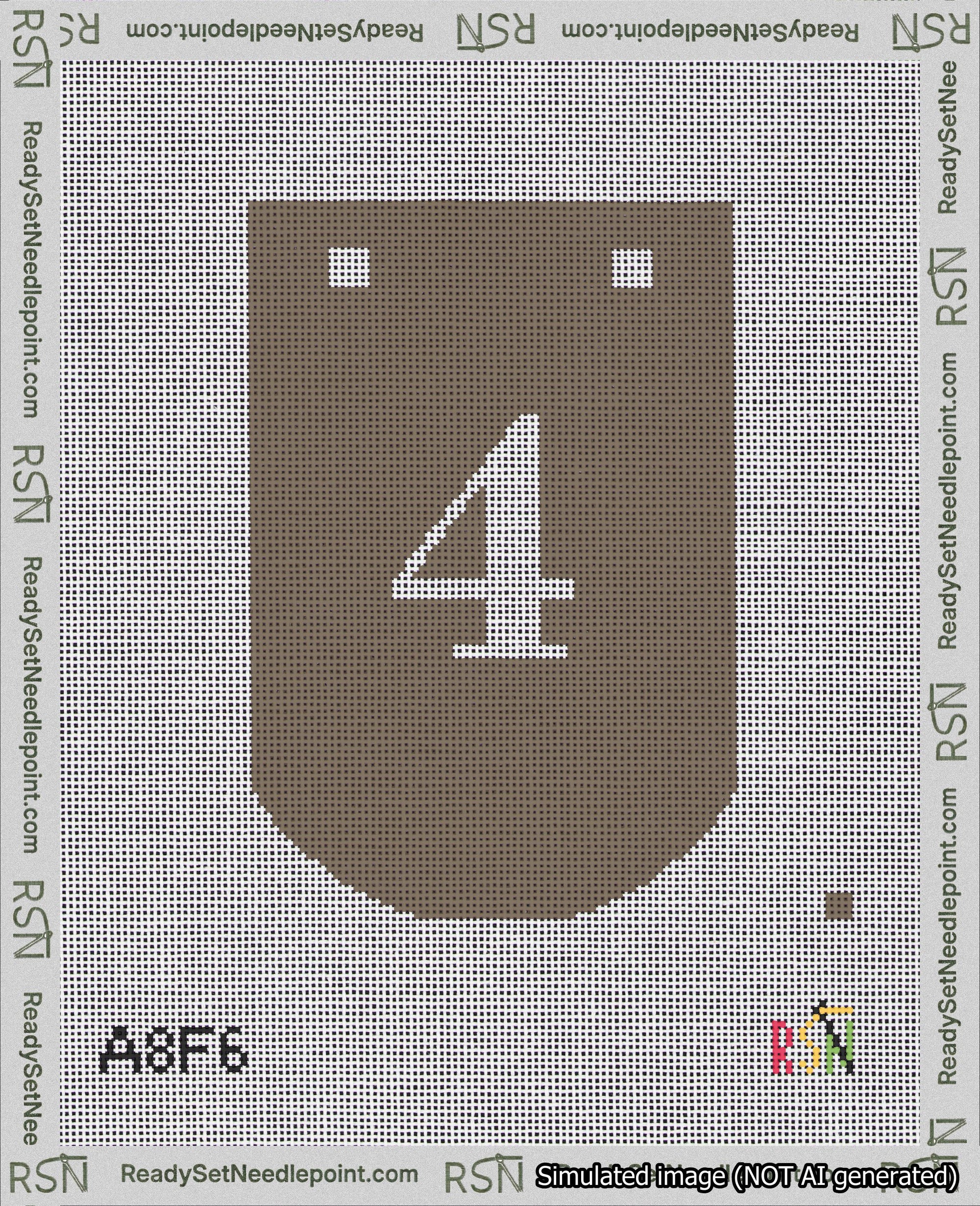 A taped needlepoint canvas with the design: Banner 18 mesh count Curved 4 White on Brown.