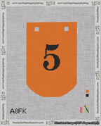 A taped needlepoint canvas with the design: Banner 18 mesh count Curved 5 Black on Orange.