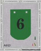 A taped needlepoint canvas with the design: Banner 18 mesh count Curved 6 Black on Green.