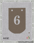 A taped needlepoint canvas with the design: Banner 18 mesh count Curved 6 White on Brown.