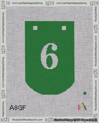 A taped needlepoint canvas with the design: Banner 18 mesh count Curved 6 White on Green.