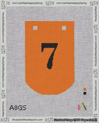 A taped needlepoint canvas with the design: Banner 18 mesh count Curved 7 Black on Orange.