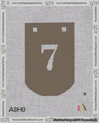 A taped needlepoint canvas with the design: Banner 18 mesh count Curved 7 White on Brown.
