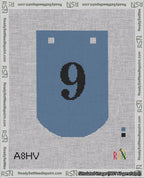 A taped needlepoint canvas with the design: Banner 18 mesh count Curved 9 Black on Blue.
