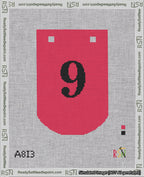 A taped needlepoint canvas with the design: Banner 18 mesh count Curved 9 Black on Red.