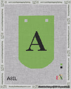 A taped needlepoint canvas with the design: Banner 18 mesh count Curved A Black on Light Green.