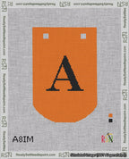 A taped needlepoint canvas with the design: Banner 18 mesh count Curved A Black on Orange.