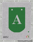 A taped needlepoint canvas with the design: Banner 18 mesh count Curved A White on Green.
