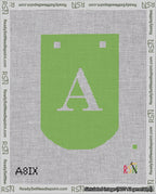 A taped needlepoint canvas with the design: Banner 18 mesh count Curved A White on Light Green.