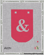 A taped needlepoint canvas with the design: Banner 18 mesh count Curved Ampersand White on Red.