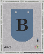A taped needlepoint canvas with the design: Banner 18 mesh count Curved B Black on Blue.