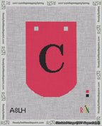 A taped needlepoint canvas with the design: Banner 18 mesh count Curved C Black on Red.