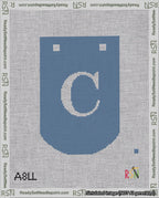 A taped needlepoint canvas with the design: Banner 18 mesh count Curved C White on Blue.