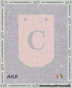 A taped needlepoint canvas with the design: Banner 18 mesh count Curved C White on Pink.