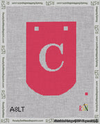 A taped needlepoint canvas with the design: Banner 18 mesh count Curved C White on Red.