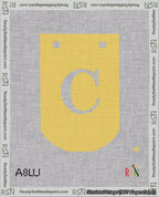 A taped needlepoint canvas with the design: Banner 18 mesh count Curved C White on Yellow.