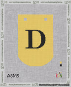 A taped needlepoint canvas with the design: Banner 18 mesh count Curved D Black on Yellow.