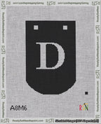 A taped needlepoint canvas with the design: Banner 18 mesh count Curved D White on Black.