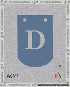 A taped needlepoint canvas with the design: Banner 18 mesh count Curved D White on Blue.