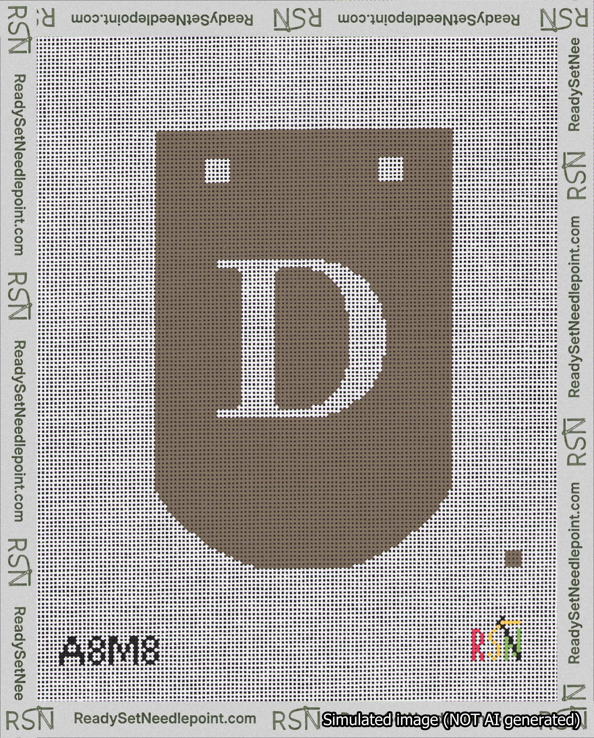 A taped needlepoint canvas with the design: Banner 18 mesh count Curved D White on Brown.