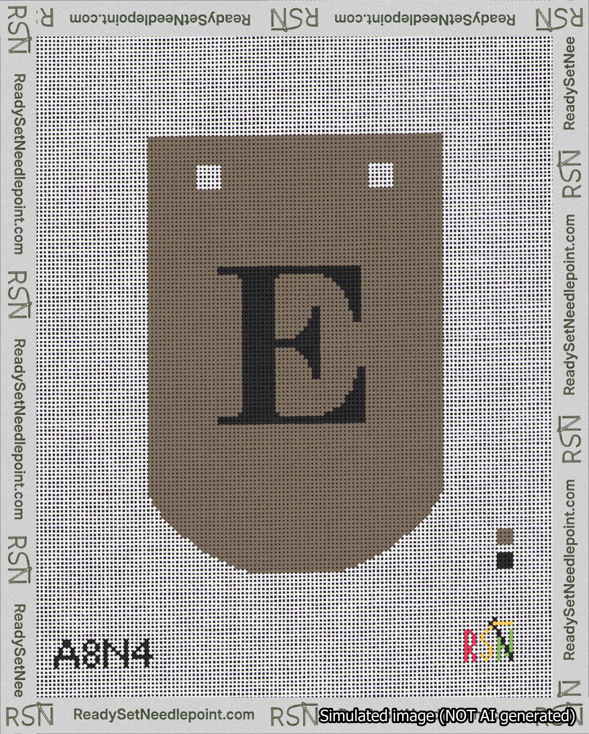 A taped needlepoint canvas with the design: Banner 18 mesh count Curved E Black on Brown.