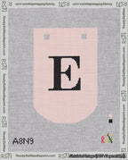 A taped needlepoint canvas with the design: Banner 18 mesh count Curved E Black on Pink.