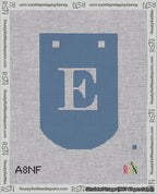 A taped needlepoint canvas with the design: Banner 18 mesh count Curved E White on Blue.